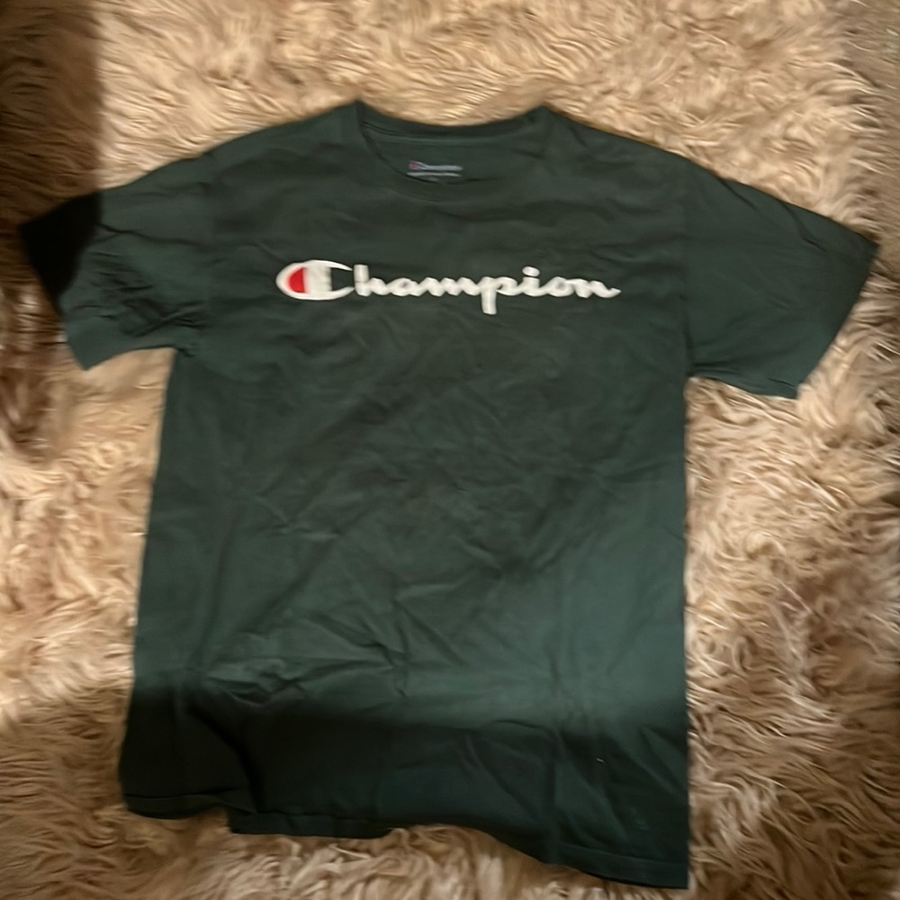 Dark green champion shirt lightly worn comfortable and authentic athletic wear